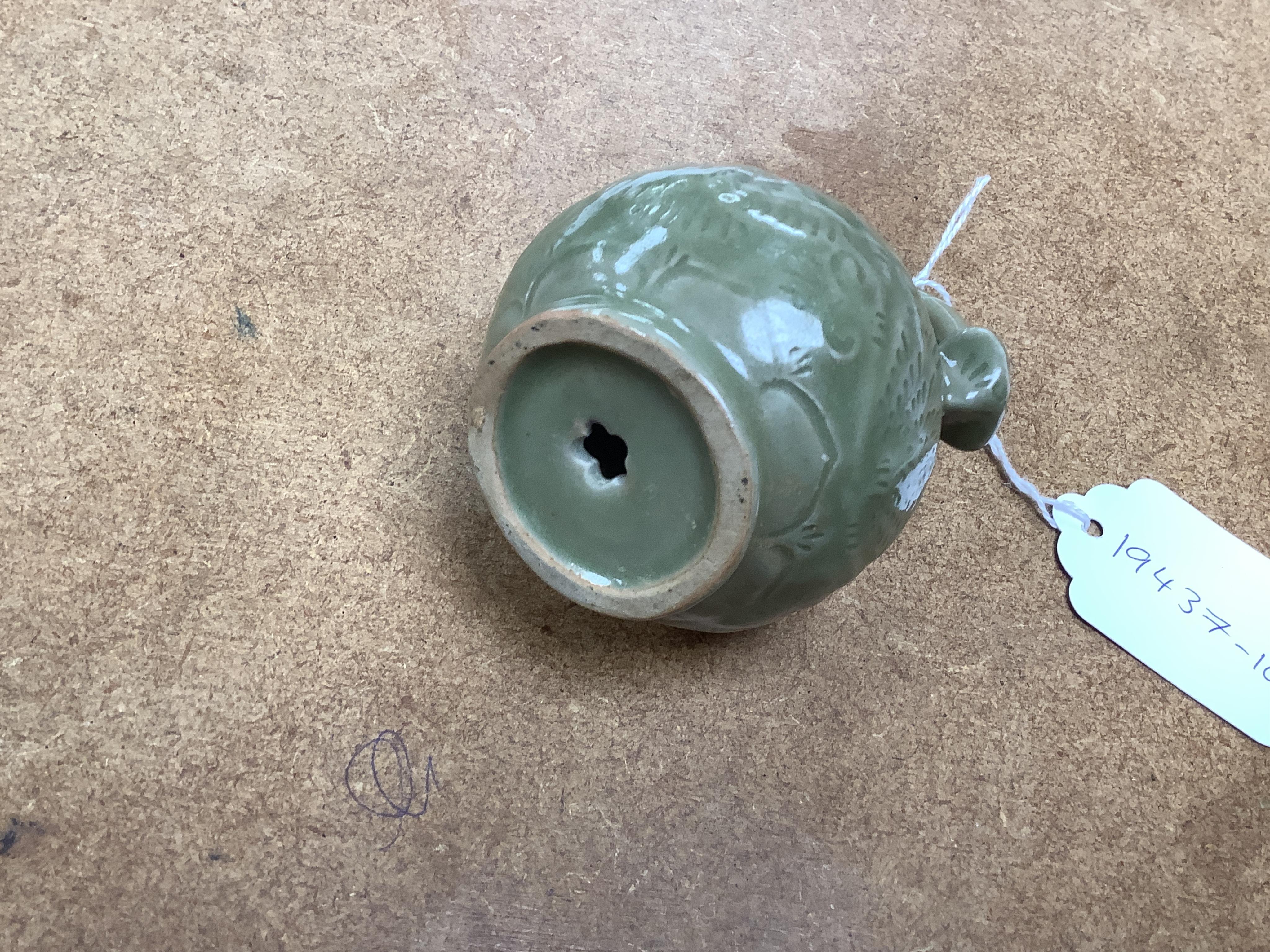 A collection of Chinese porcelain and pottery to include a naturalistic teapot, crackle glaze bowl and a ‘dragon’ bowl, largest 10cm in diameter